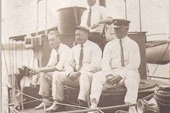 Sitting, left to right, Ralph Anson Downes, Frederick's brother and business partner Charles Dwight Downes, and Frederick.