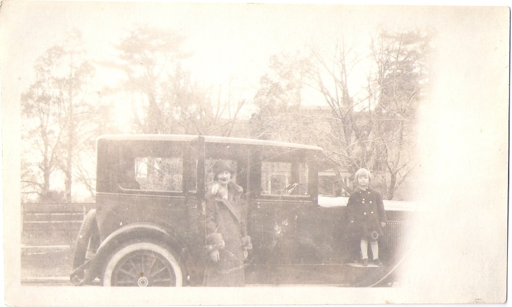 Ralph Torrance on the Fender of Automobile