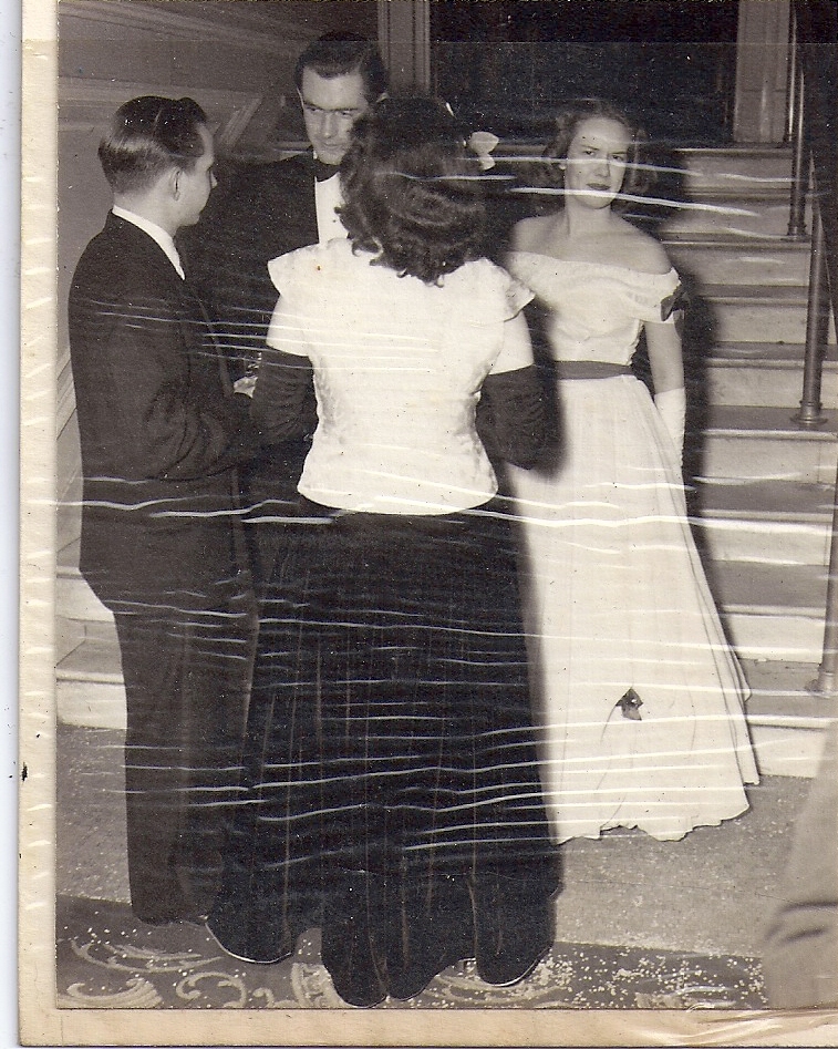 Ralph Downes and Date at a Formal Gathering