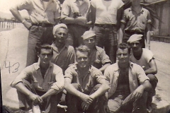 Ralph Torrance Downes among Navy Buddies (lower left) 1943